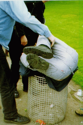 [Image:  man and bin...  er...  man IN bin]